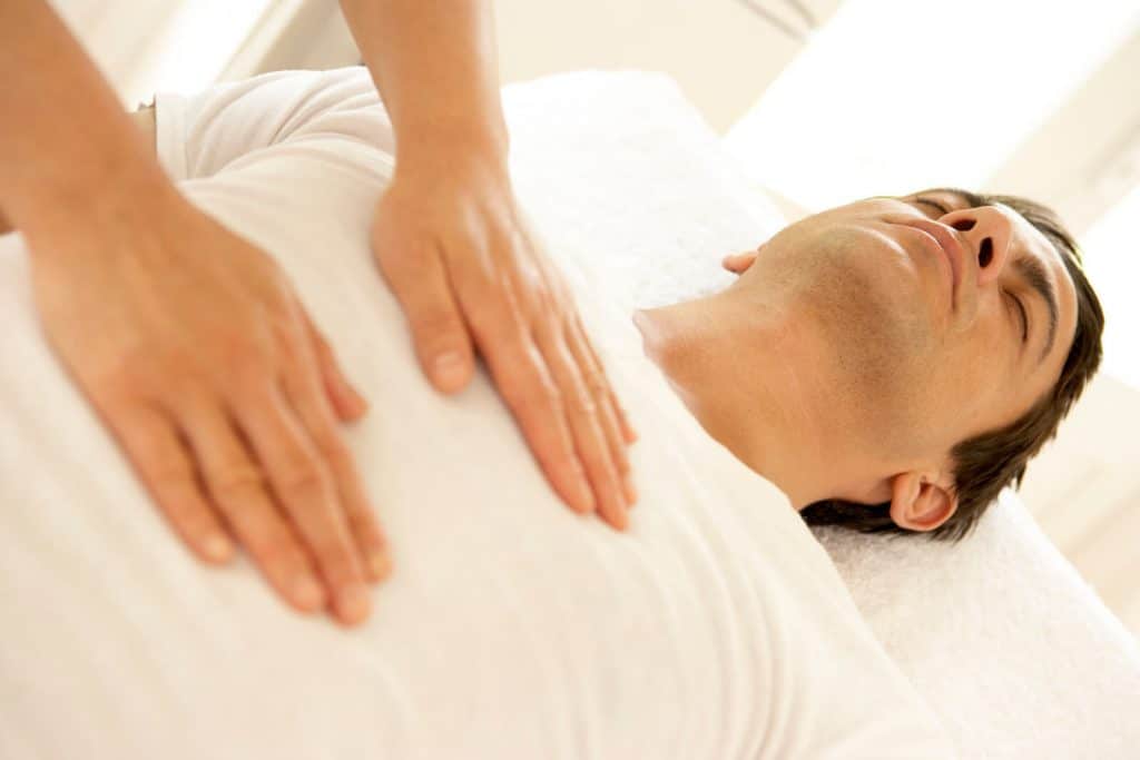 chest rubbing - chest massaging