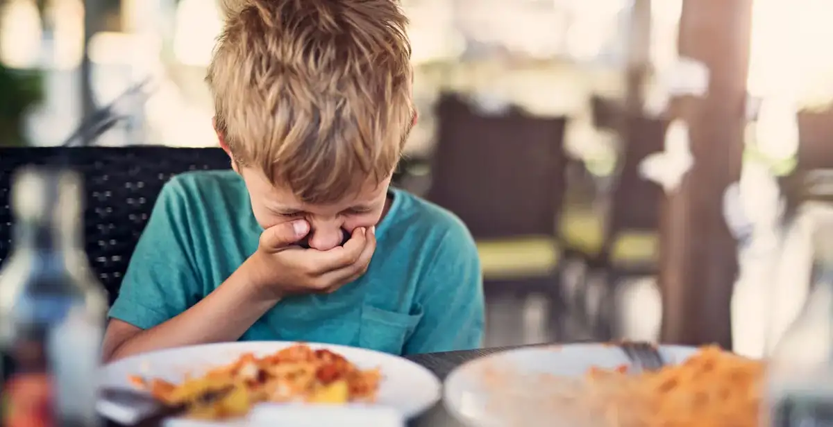 Toddlers Holding Food in Their Mouths